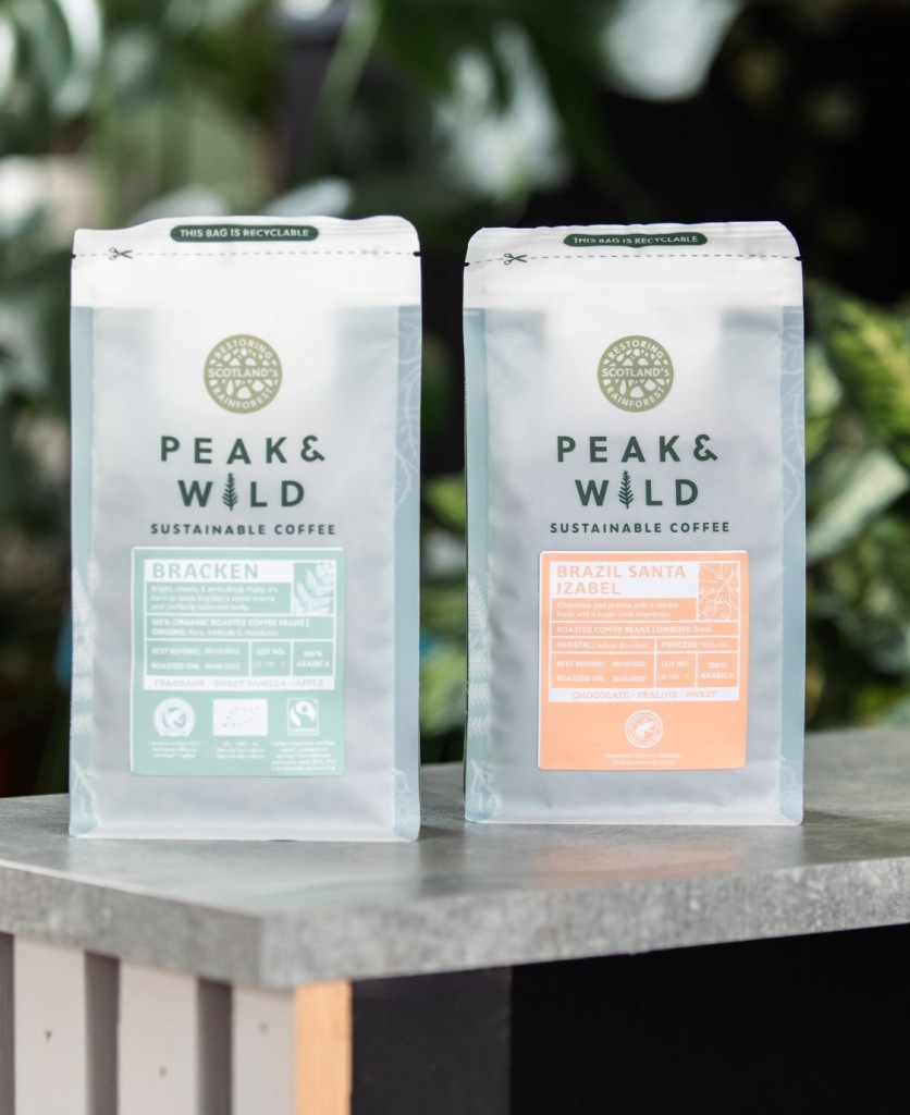 Two packets of Peak and Wild coffee beans by Matthew Algie sat on a worktop