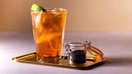 Peach iced tea in a glass made with davinci peach and lemon tea syrup